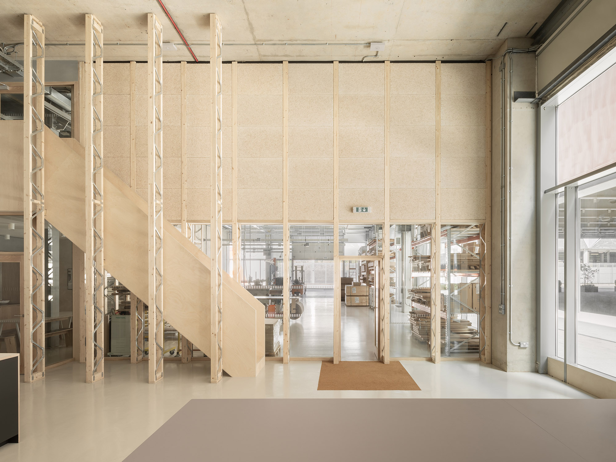 Erbar Mattes Architects Here East Stratford Hackney Plykea workshop showroom office refurbishment retrofit interior fit out timber studwork open web joists wood wool boards